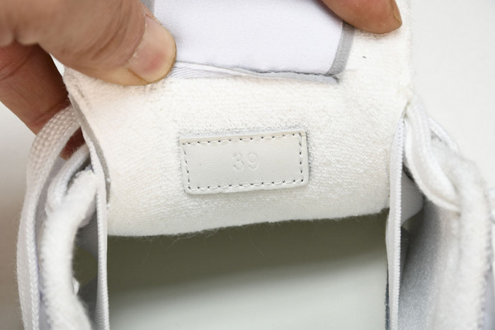 G*u*i screener sneaker